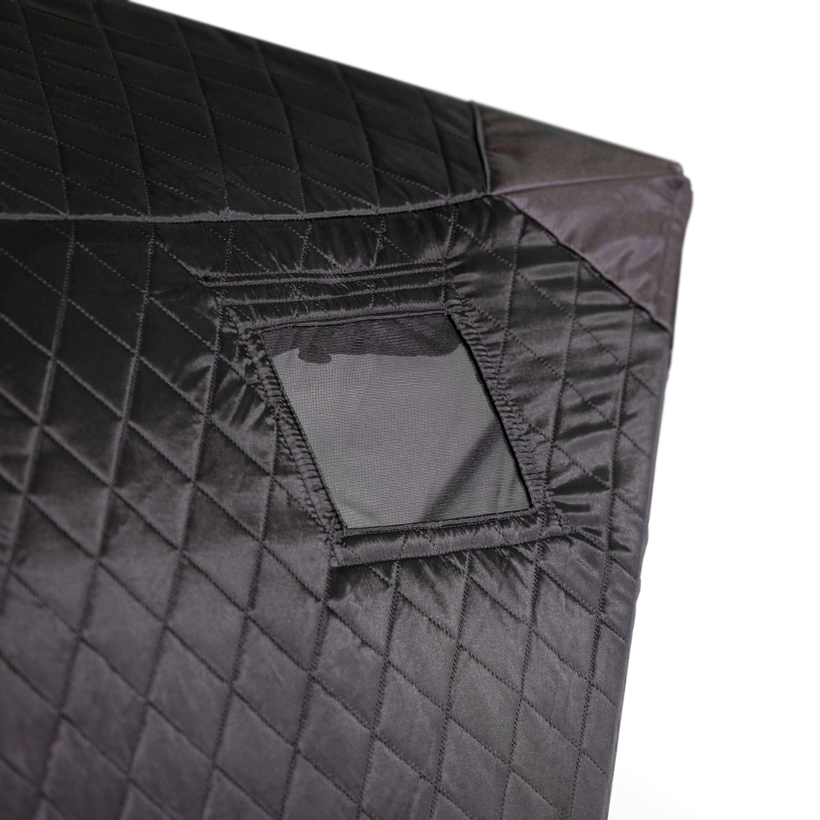SaunaLife SaunaTrekker Portable Sauna Tent showing a close-up of the insulated fabric with a mesh window.