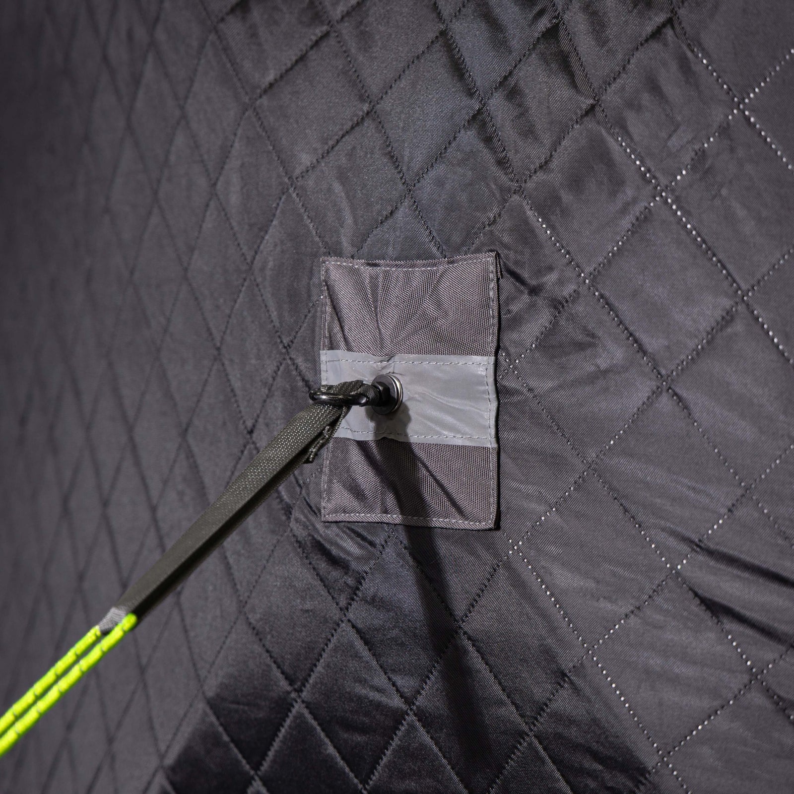 Close-up of the durable fabric and adjustable tie of the SaunaLife SaunaTrekker Portable Sauna Tent.