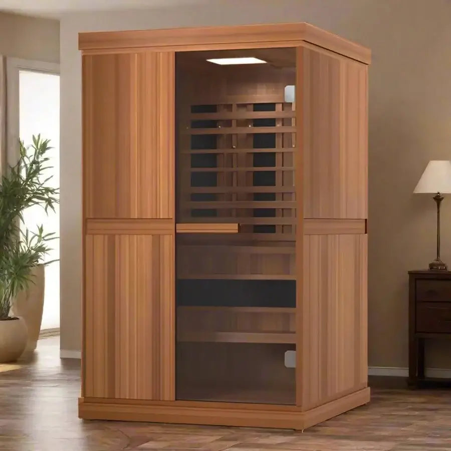 Finnmark Designs FD-4 wooden sauna in a room with a lamp and plant