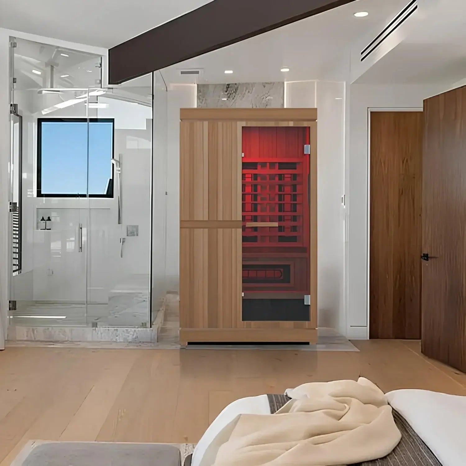 Modern interior with a Finnmark Designs FD-4 wooden sauna and a shower area