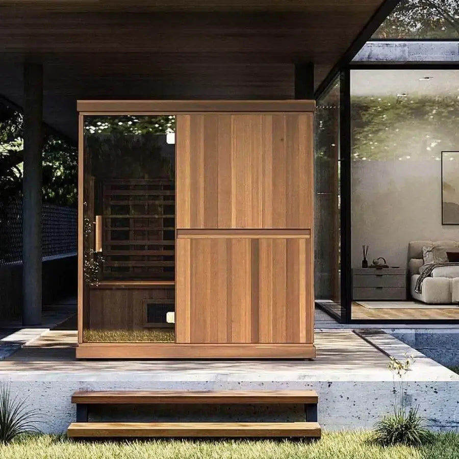 Finnmark FD-3 wooden outdoor sauna with glass door in a modern home setting