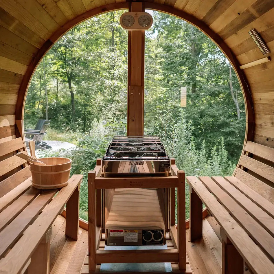 Harvia KIP with built in controls sauna heater in barrel sauna with big glass window in the back