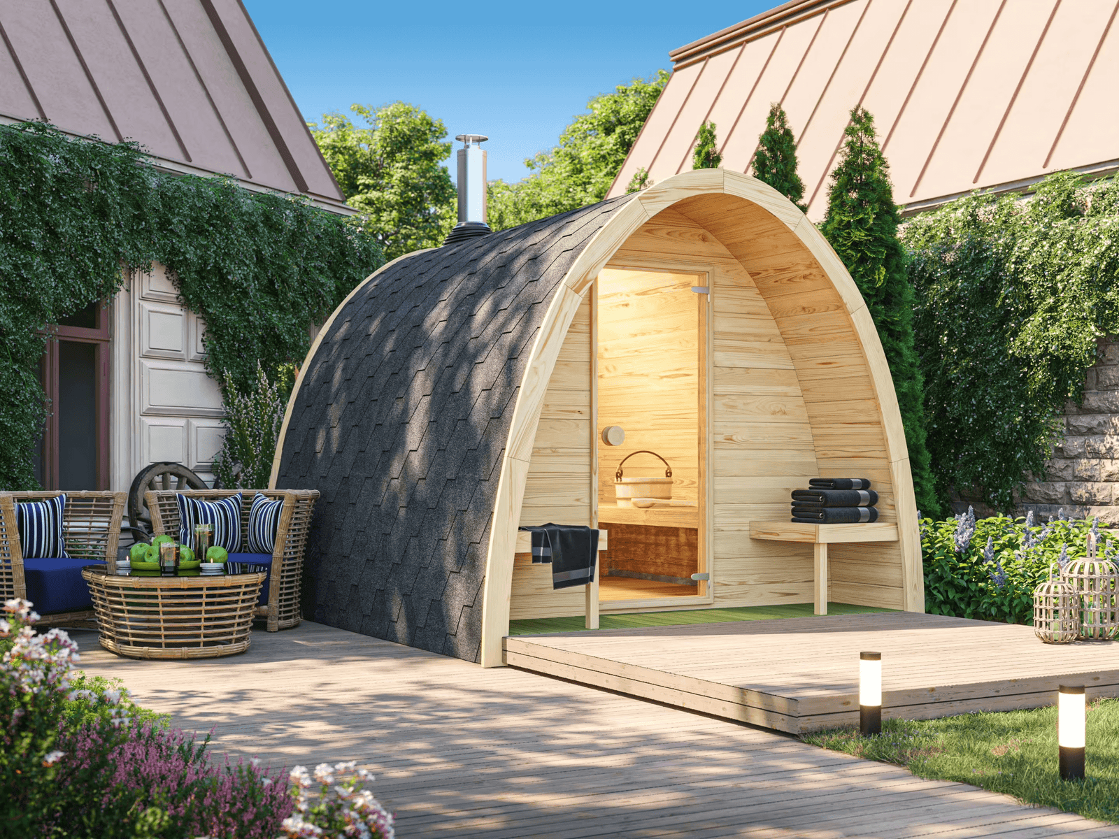 Outdoor Saunalife G3 sauna with a parabolic arched roof, wooden staves and a bronze-tinted glass door, set on a wooden platform with outdoor seating and greenery in the background.