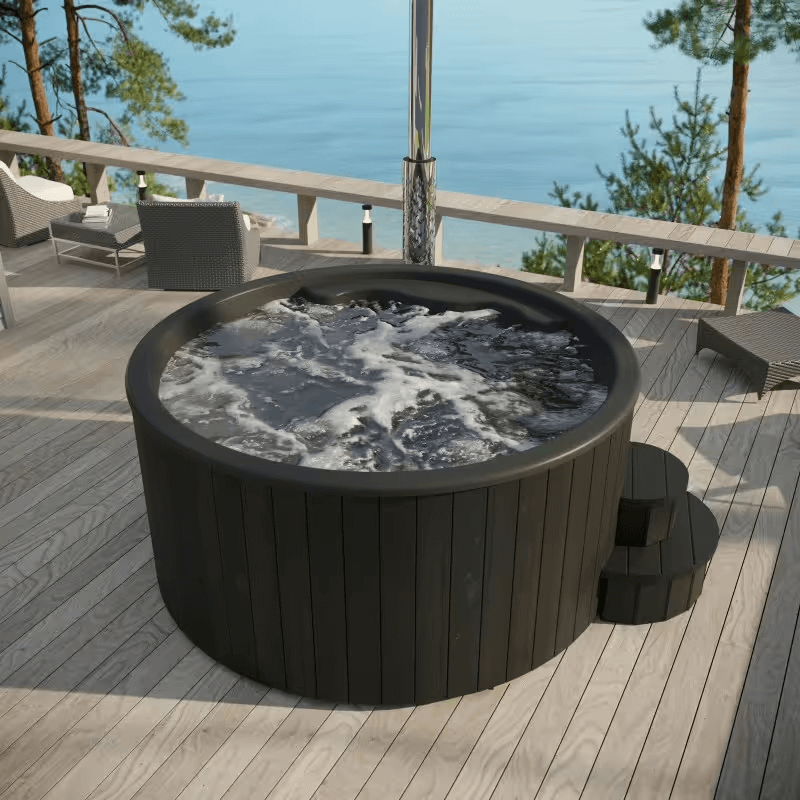 Back-color SaunaLife S4B wood-fired outdoor hot tub on a wooden-deck