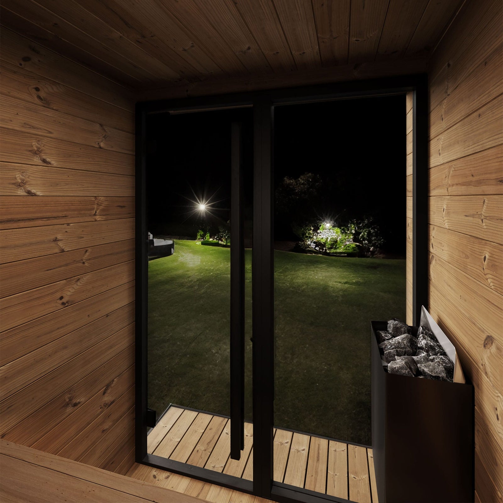 SaunaLife GL4 wooden sauna interior with a view of a garden at night.