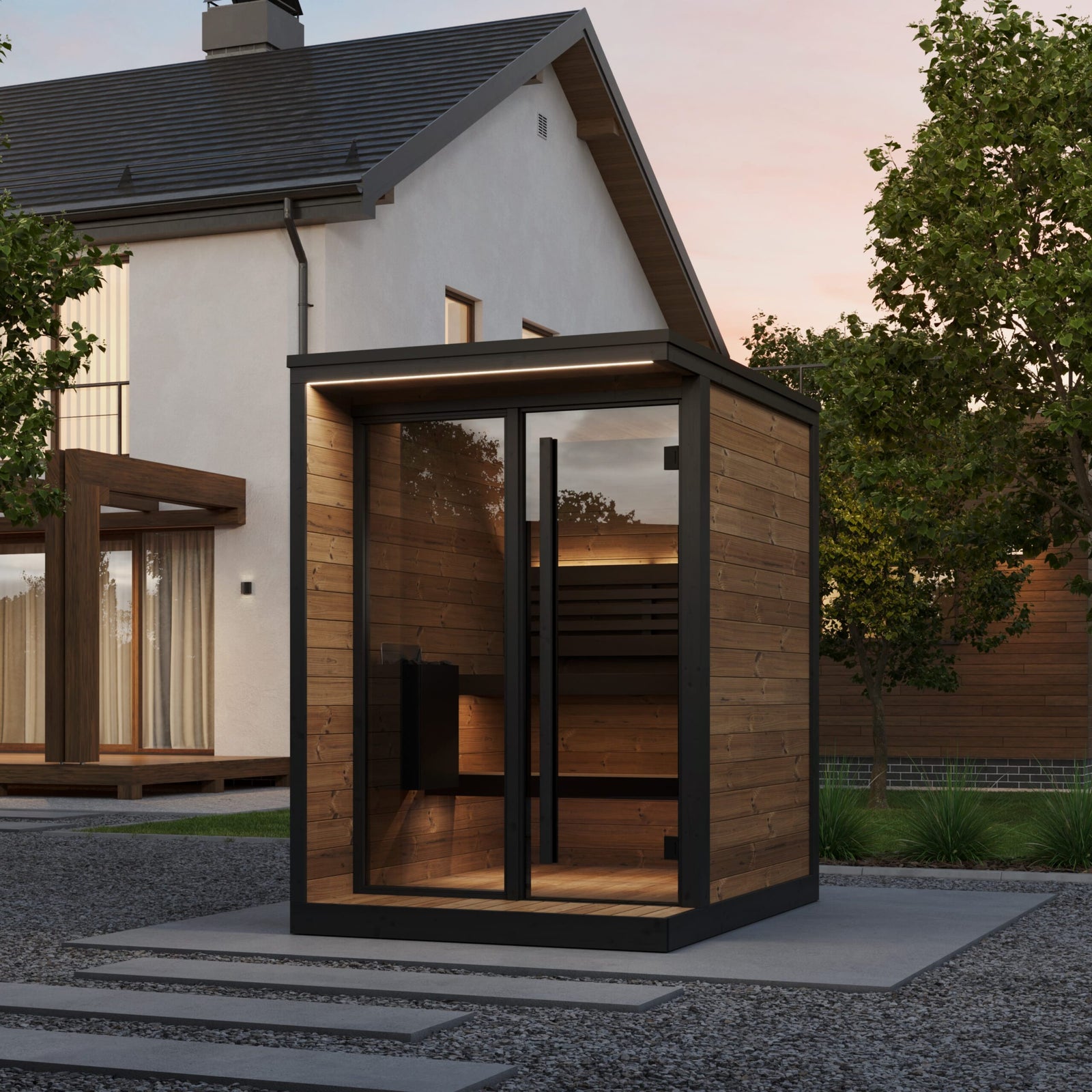 SaunaLife's modern GL4 outdoor cabin with wooden exterior, big glass door and windw set against a house and trees.