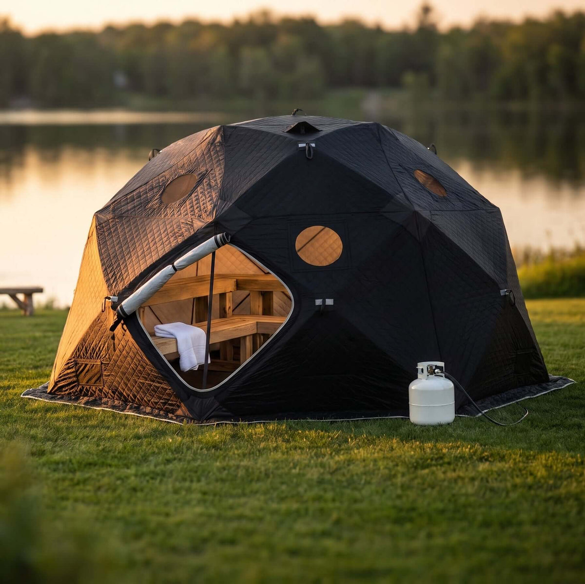 SaunaLife SaunaTrekker XL Portable Sauna Tent set up outdoors, accommodating up to 6 bathers by a scenic lake.