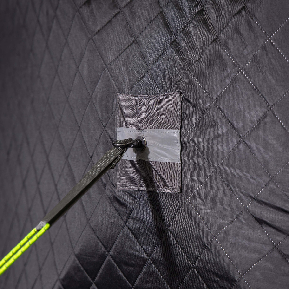Close-up of the durable fabric and adjustable tie of the SaunaLife SaunaTrekker Portable Sauna Tent.