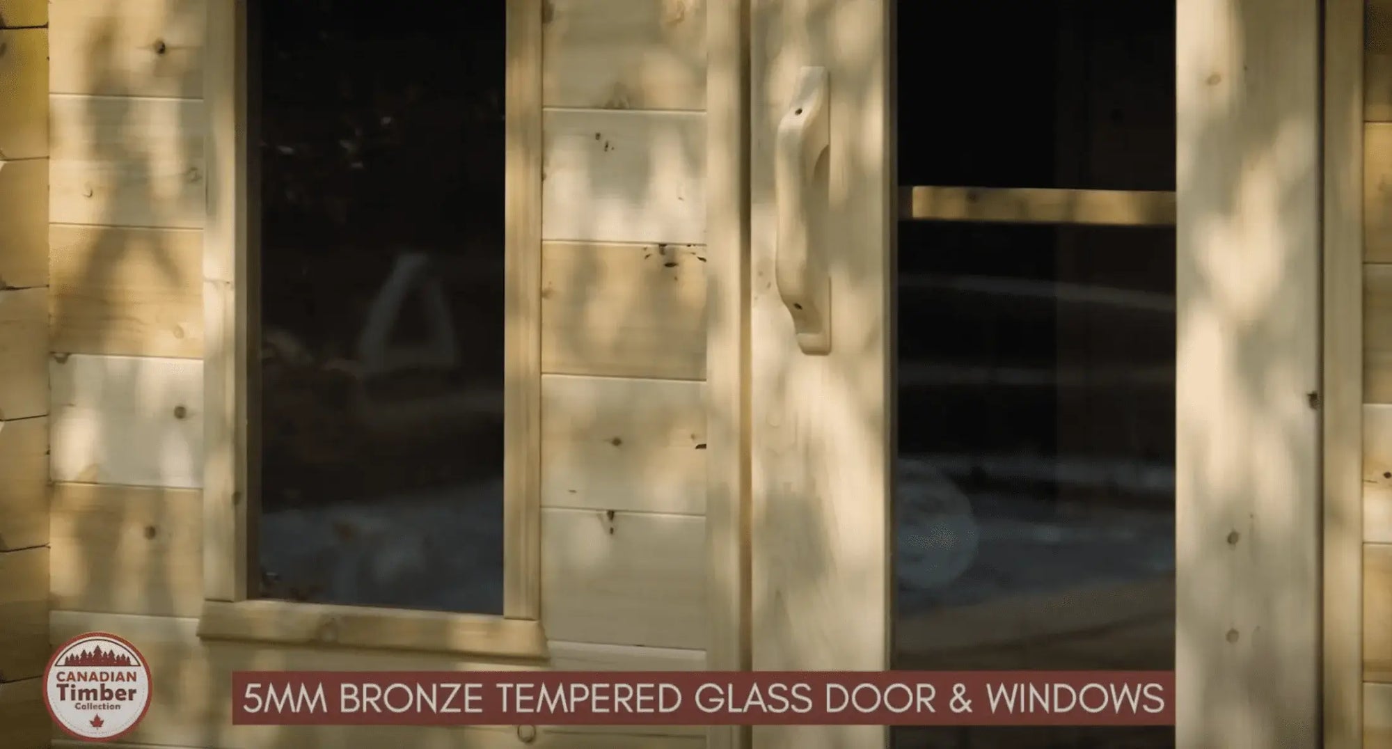 5mm bronze tempered glass door and windows of Dundalk Leisurecraft Georgian Cabin Sauna with Changeroom. CTC88CW