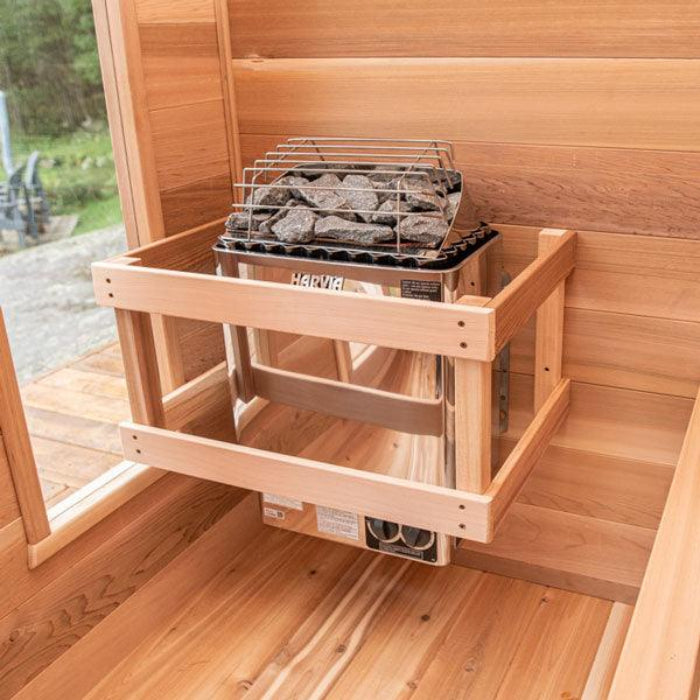 Wooden sauna interior with the Harvia KIP with built in controls sauna heater.