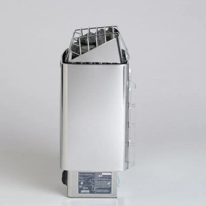 Harvia KIP with built in controls sauna heater with metal basket and stones on a grey background.