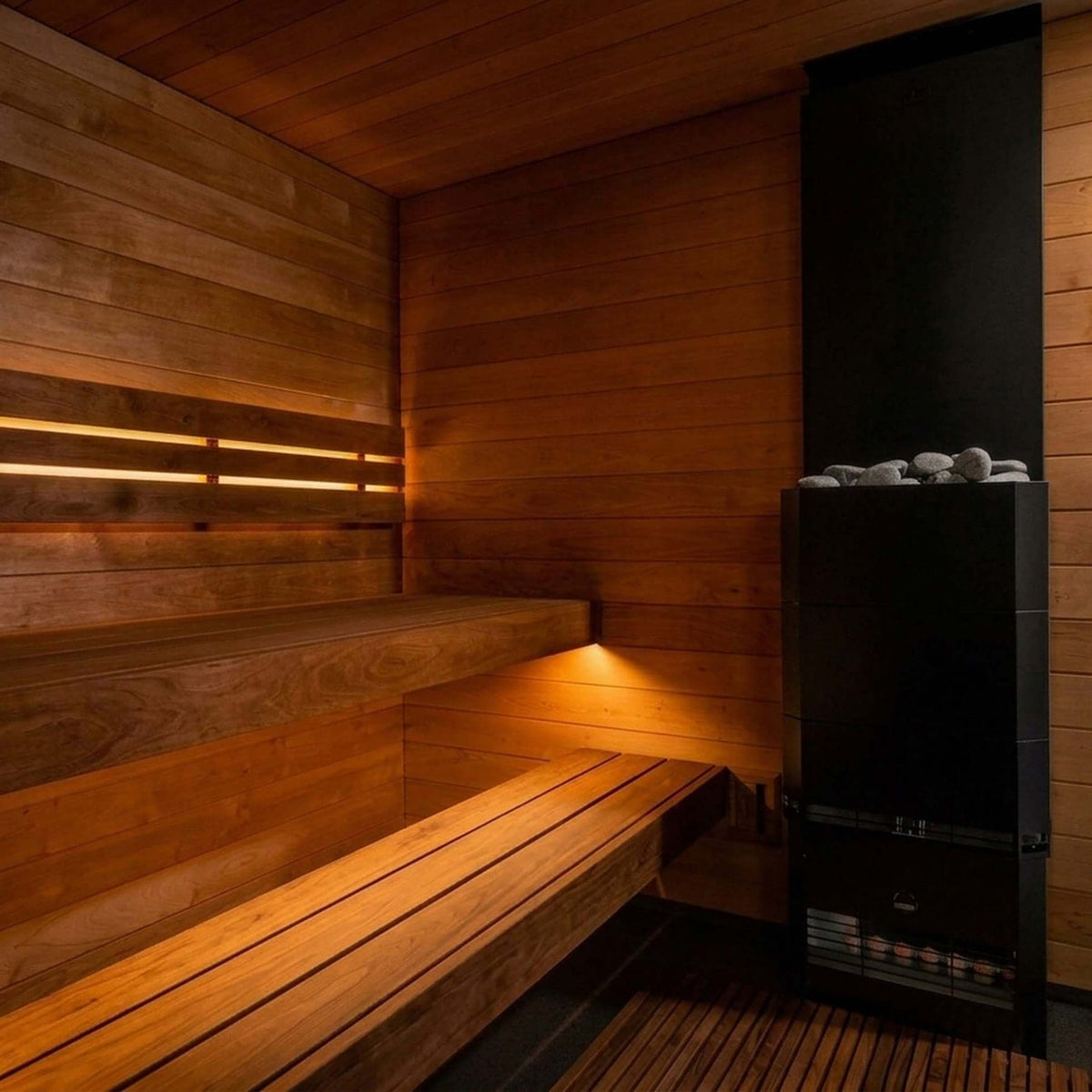 The cozy wooden SaunaLife G6 sauna interior with tiered wooden benches, warm ambient lighting, and a black wood-burning heater on the right side.