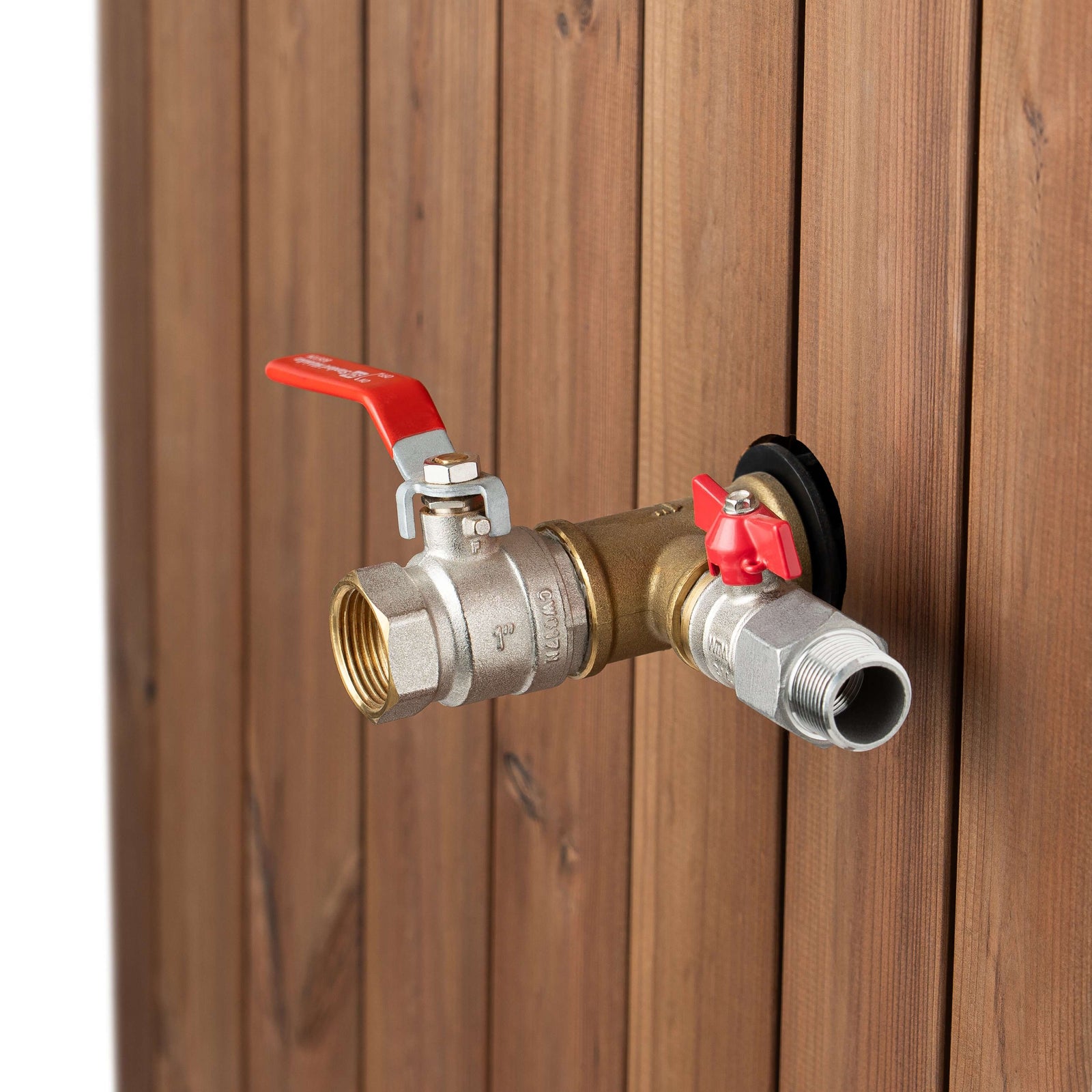 Close-up of the brass valve with red handles attached to the black wooden SaunaLife S2N immersion tub 
