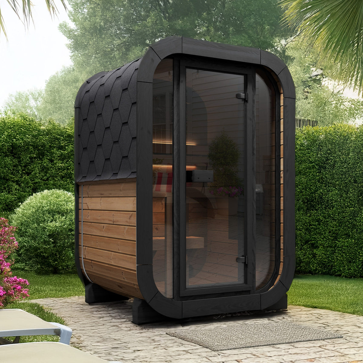Modern outdoor SaunaLife CL3G sauna pod with glass front wall in a garden setting.